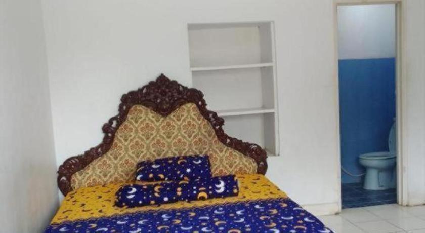 Oyo 93146 Lamin Indah Hotel Пунсак Екстериор снимка